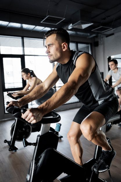 people doing indoor cycling 23 2149270241